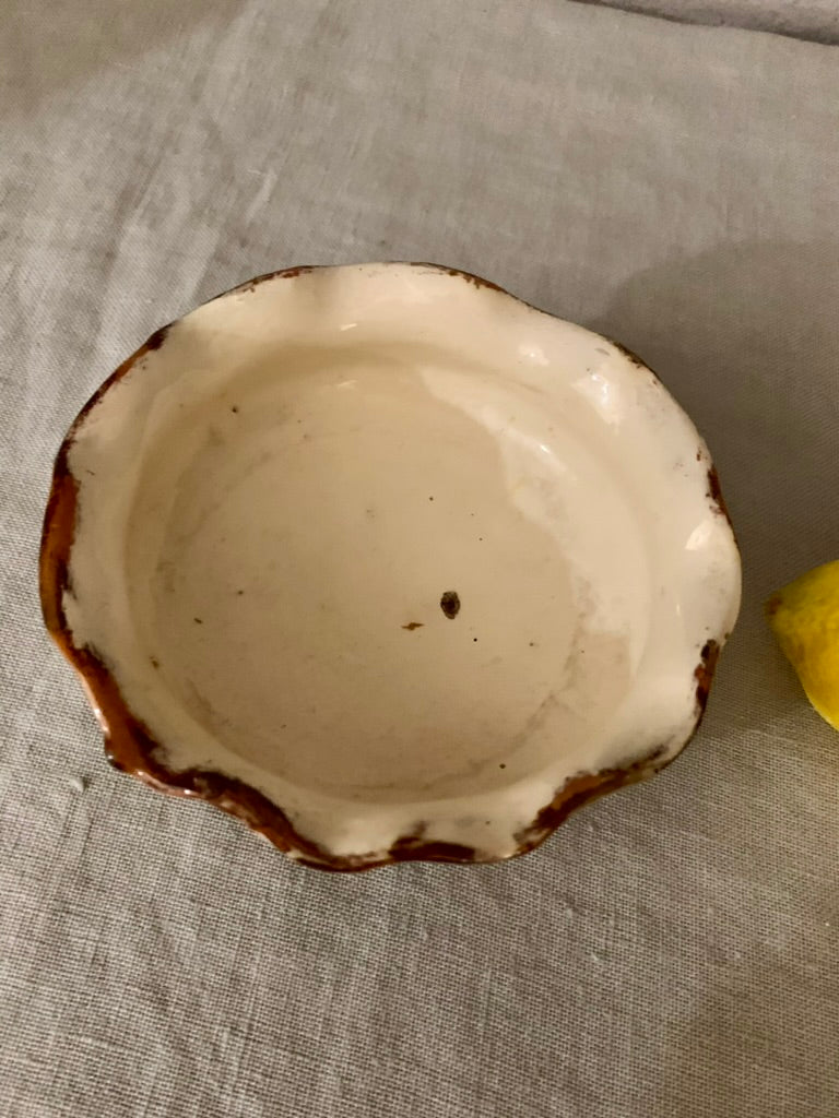 Small ceramic bowl with frilled edge