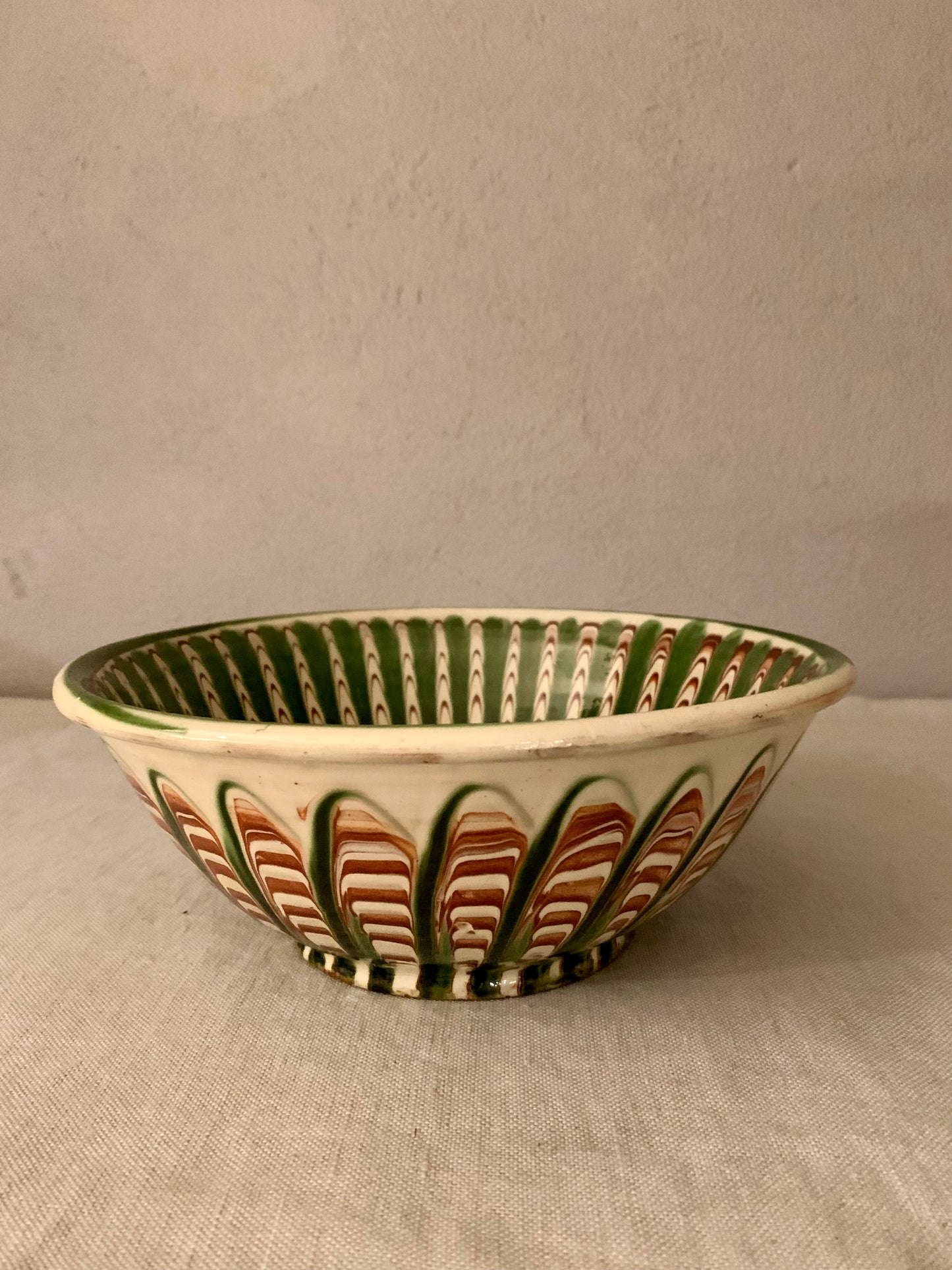 Vintage Clay Bowl with Running Glaze