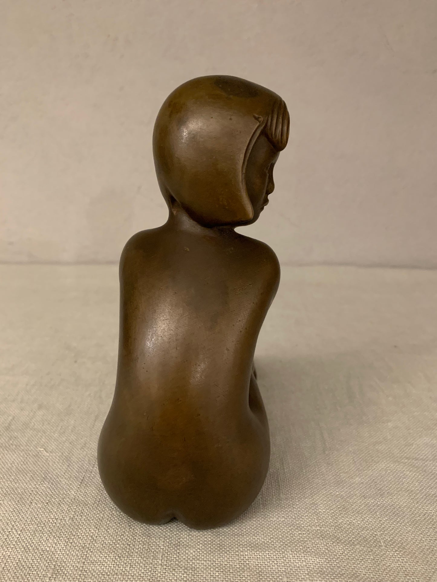 Bronze Figurine Depicting a Sitting Girl, by Johannes Hedegaard