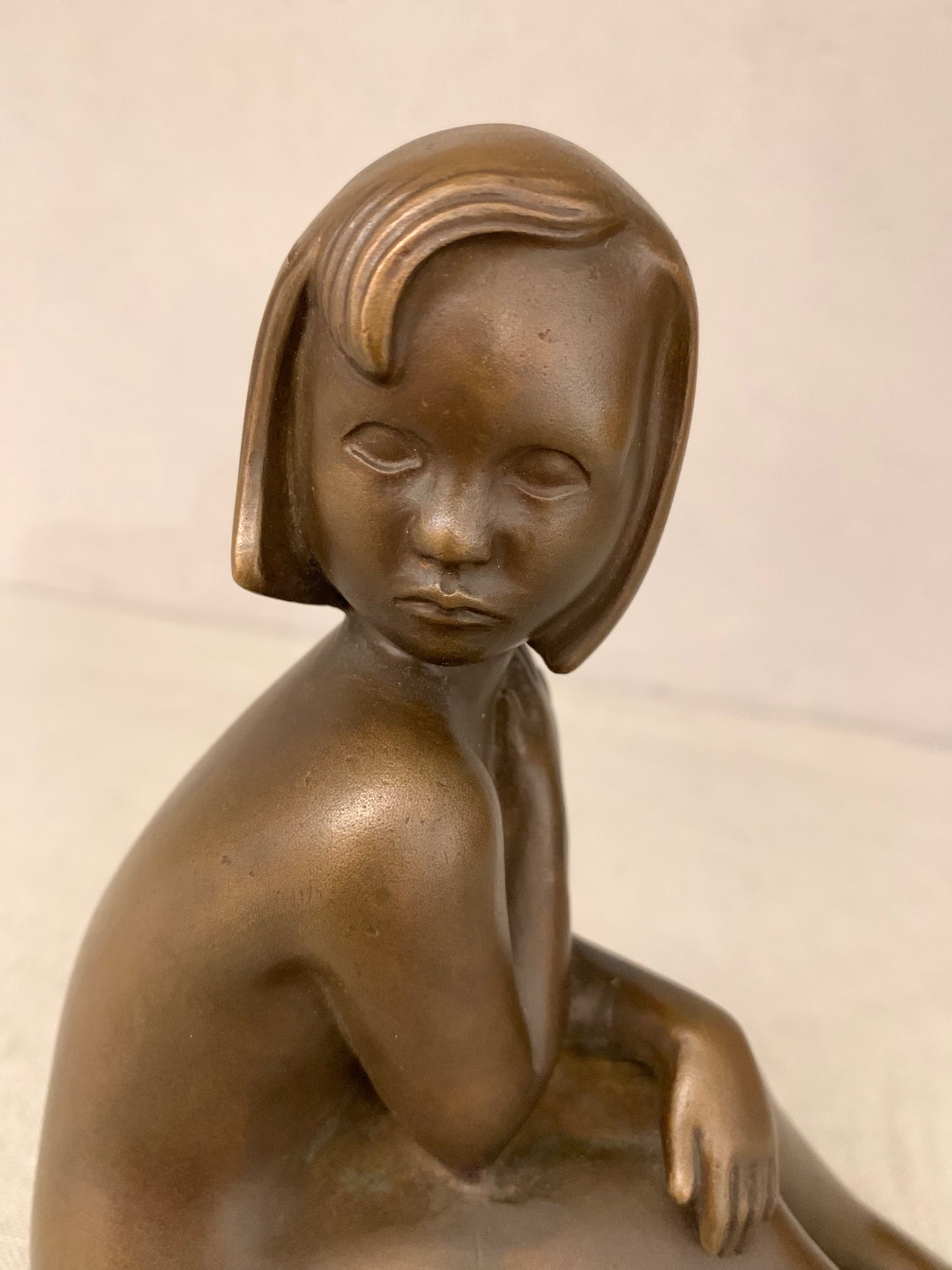 Bronze Figurine Depicting a Sitting Girl, by Johannes Hedegaard