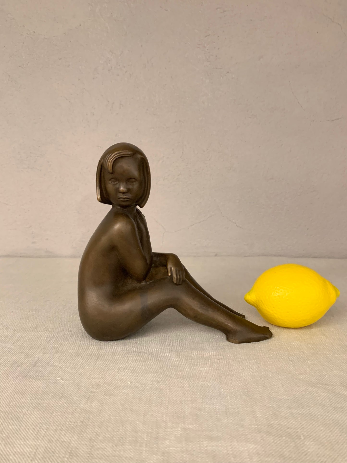 Bronze Figurine Depicting a Sitting Girl, by Johannes Hedegaard