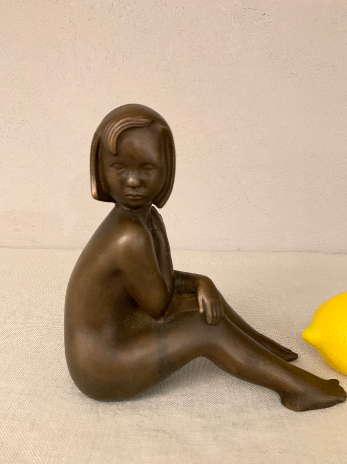 Bronze Figurine Depicting a Sitting Girl, by Johannes Hedegaard