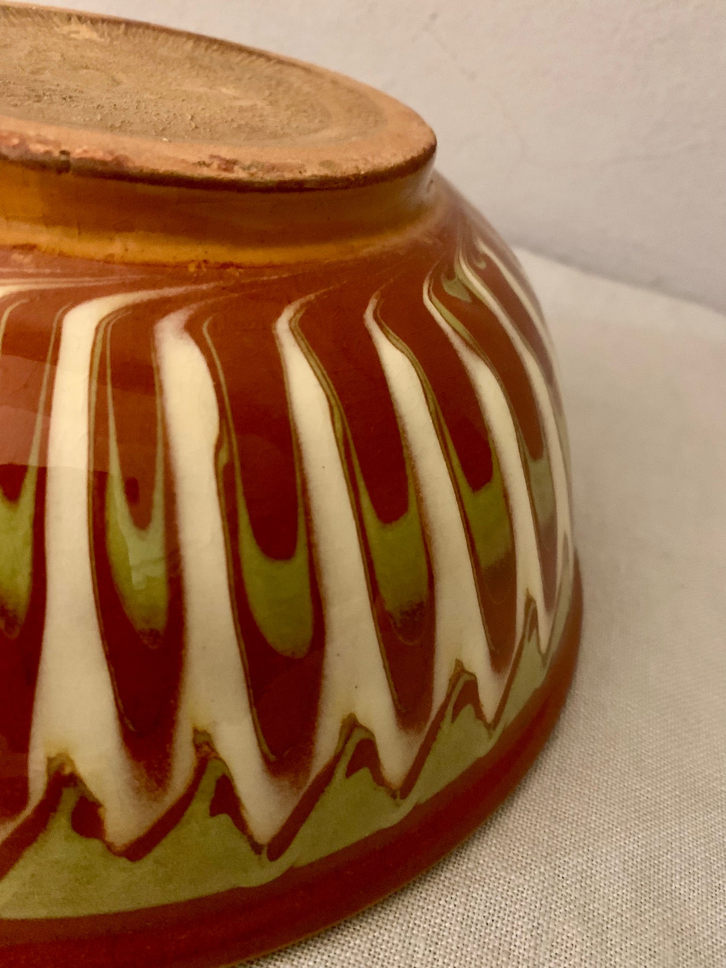 Vintage Clay Bowl with Running Glaze
