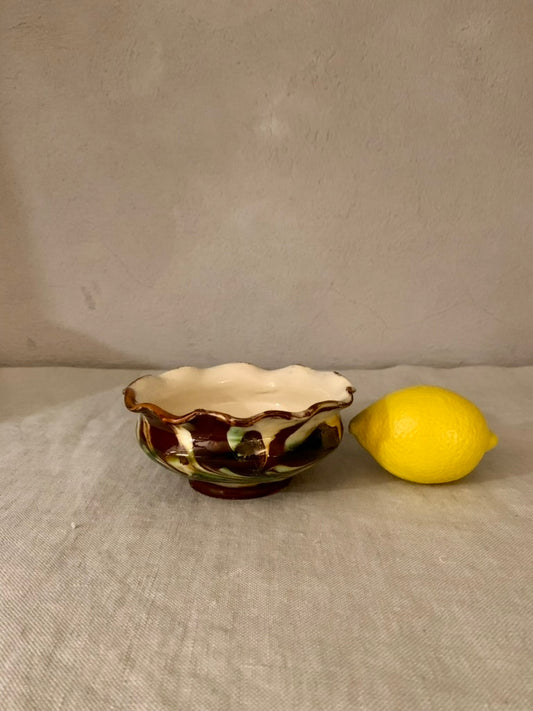 Small ceramic bowl with frilled edge