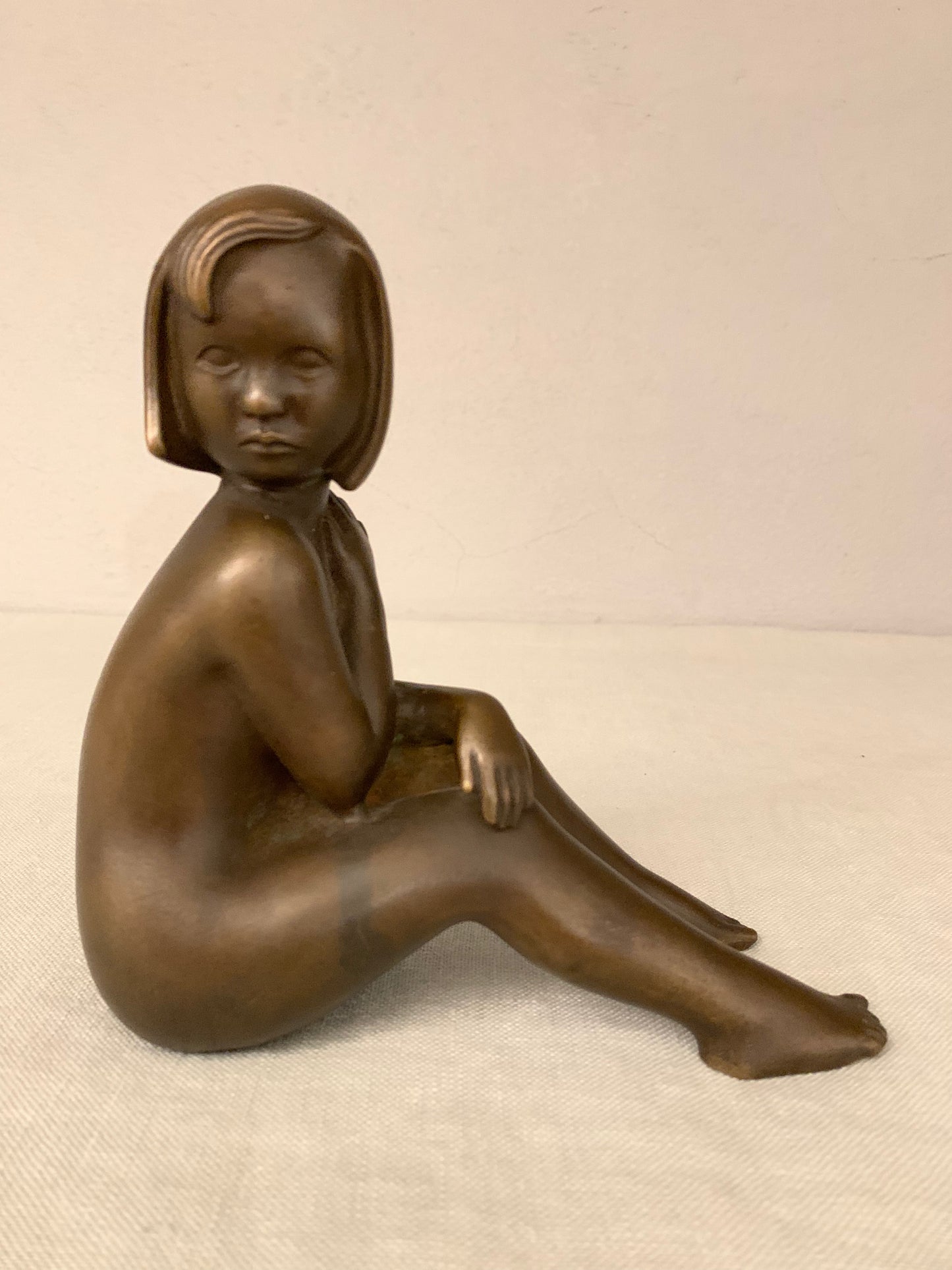 Bronze Figurine Depicting a Sitting Girl, by Johannes Hedegaard
