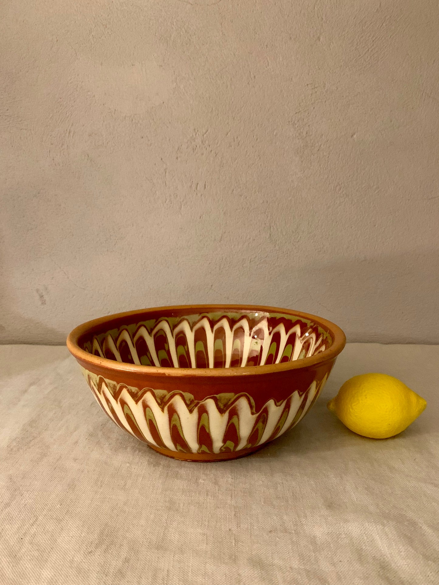 Vintage Clay Bowl with Running Glaze