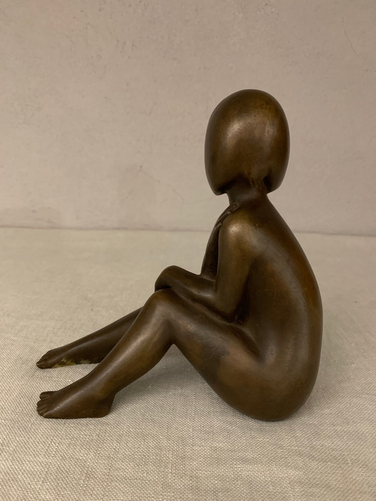 Bronze Figurine Depicting a Sitting Girl, by Johannes Hedegaard